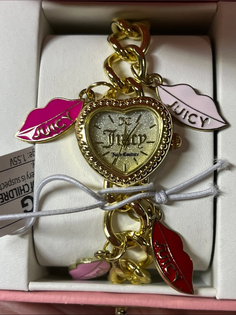 Juicy Couture gold tone